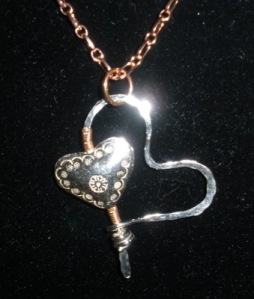 Double heart pendant with sterling and Thai silver and copper.