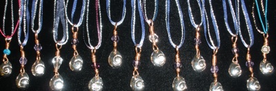 There will be plenty of these fine silver "janthina, janthina" pendants, each a little different.